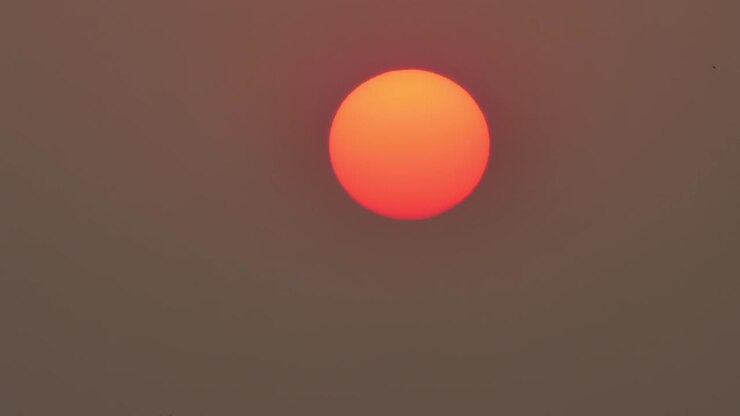 Beautiful big sunset on sky in the evening. background red sunset speed up video