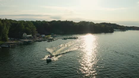 aerial of water skiers at a water ski show on balsam lake, wisconsin