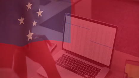 chinese flag animation over person working on laptop with data