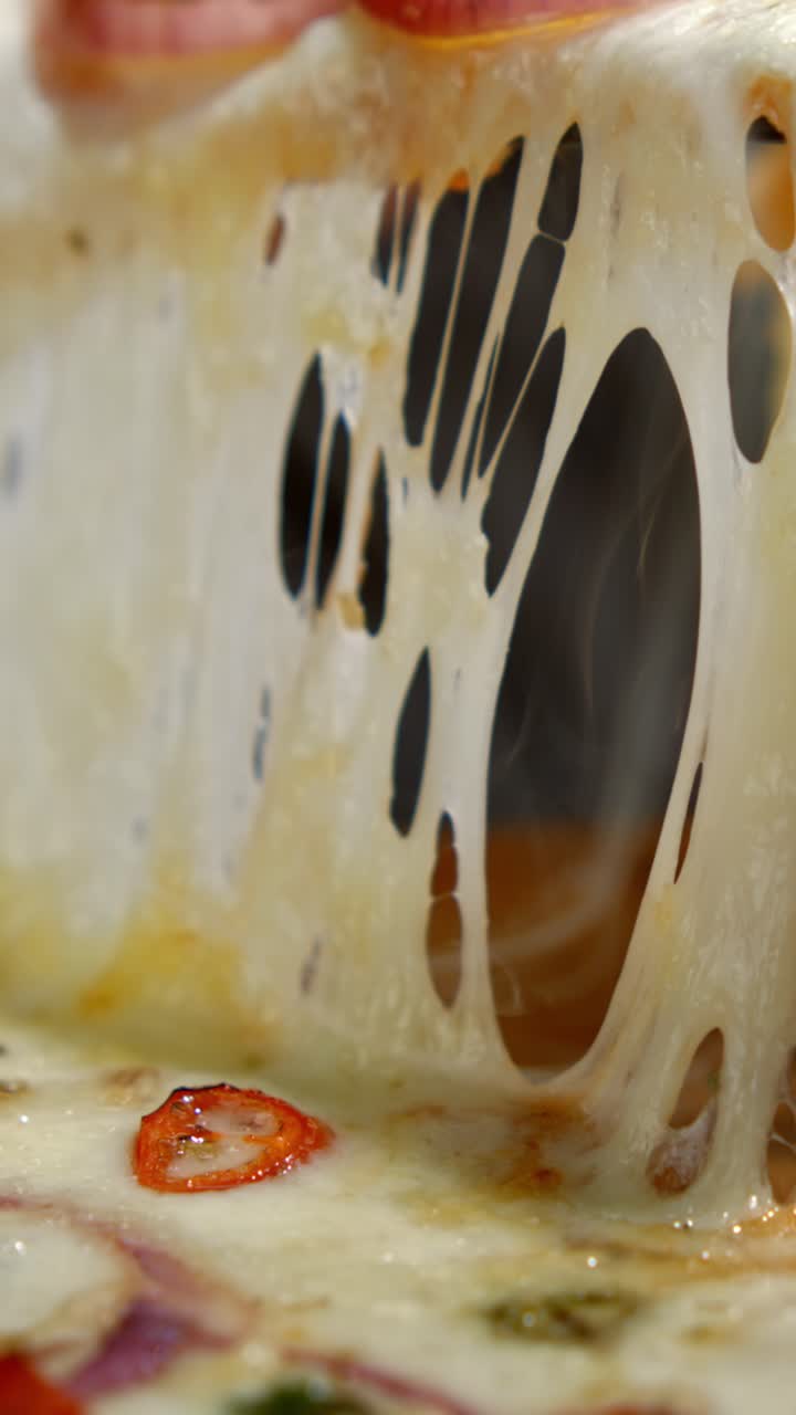 Close-up of Delicious Melting Cheese Pizza
