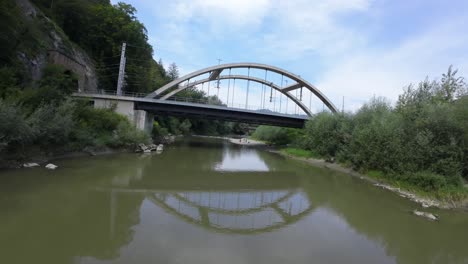 soaring through austrian landscapes with an fpv drone, under bridges and over the mura river