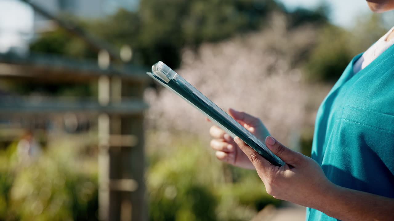 Woman holding clipboard outdoors