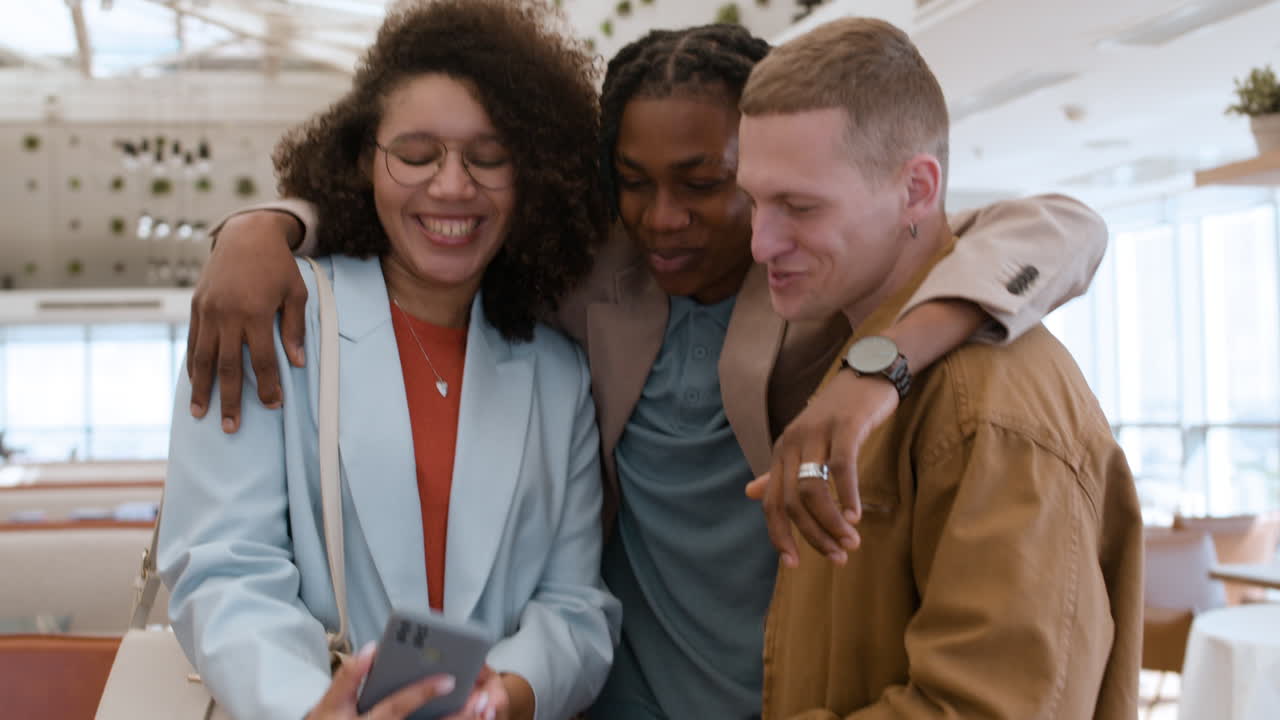 Friends Taking a Selfie in a Restaurant