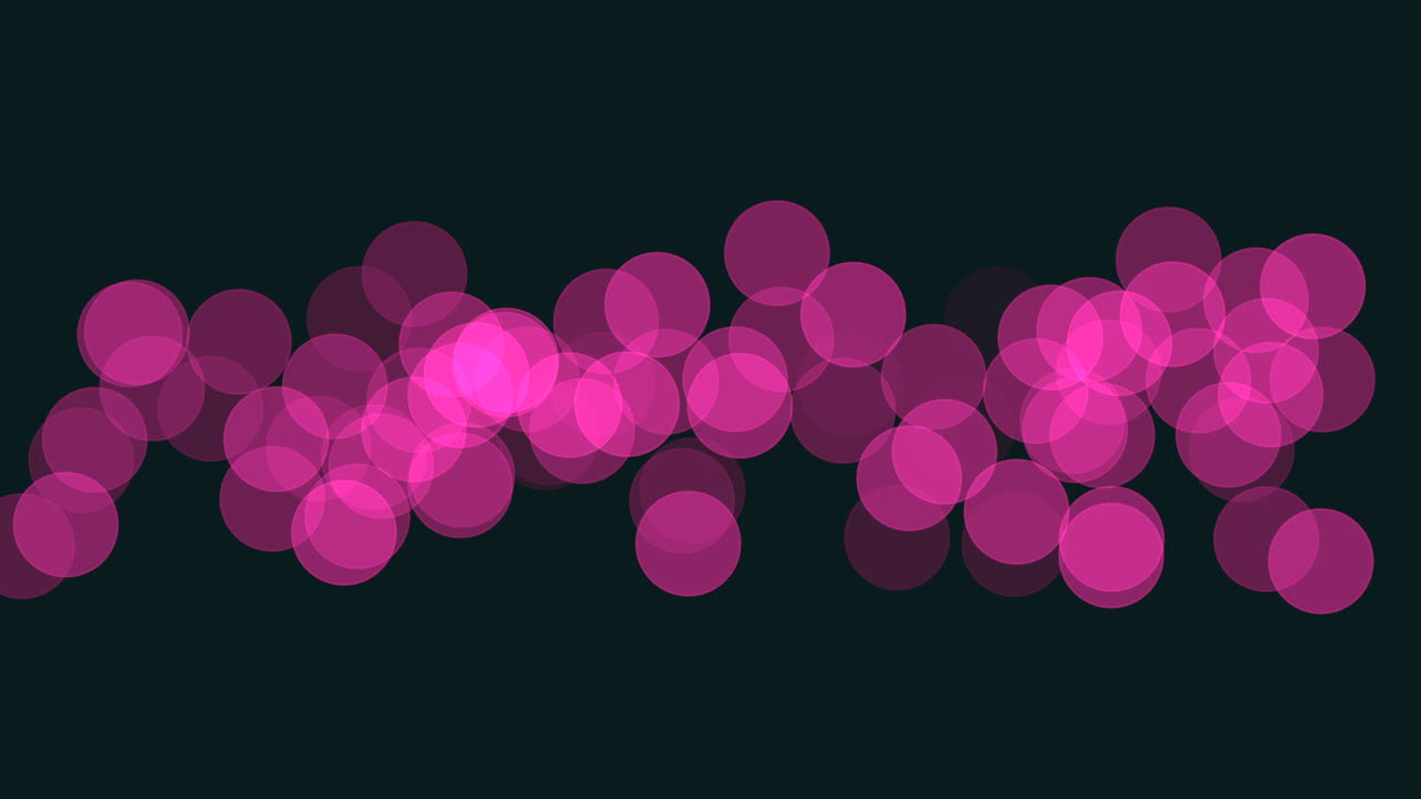 Mesmerizing array of floating pink circles in a black background