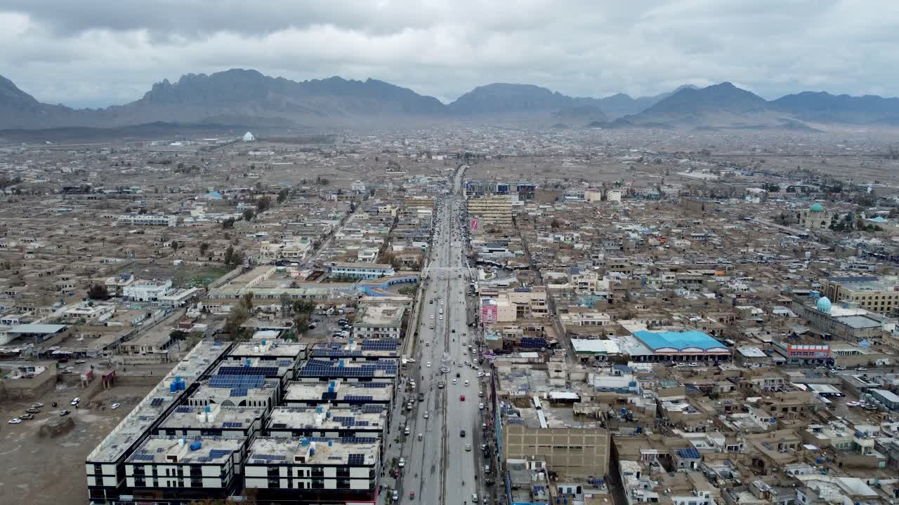 Kandahar, Afghanistan. Aerial View of City Traffic, Business and Residential Buildings, Establishing Drone Shot