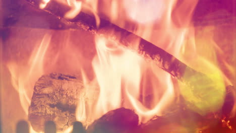 flames in log fire burning in a fireplace