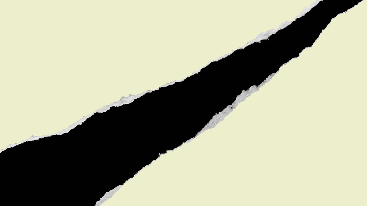 Light Yellow Paper Tearing Diagonally to Reveal Black Background