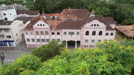 aerial-view-of-Fundação-Cultural-Blumenau,-historic-building-and-former-city-hall,-city-in-the-Itajaí-valley,-state-of-Santa-Catarina,-southern-Brazil