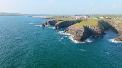 aerial view of rugged coastline and cliffs in cornwall, uk