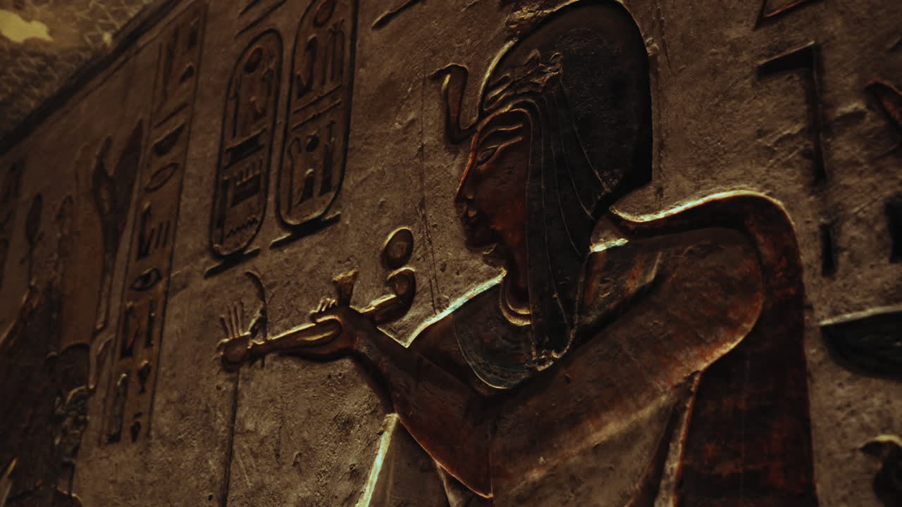 A vivid wall relief of a pharaoh offering to the gods, surrounded by hieroglyphic inscriptions that capture the artistry of ancient Egyptian tombs