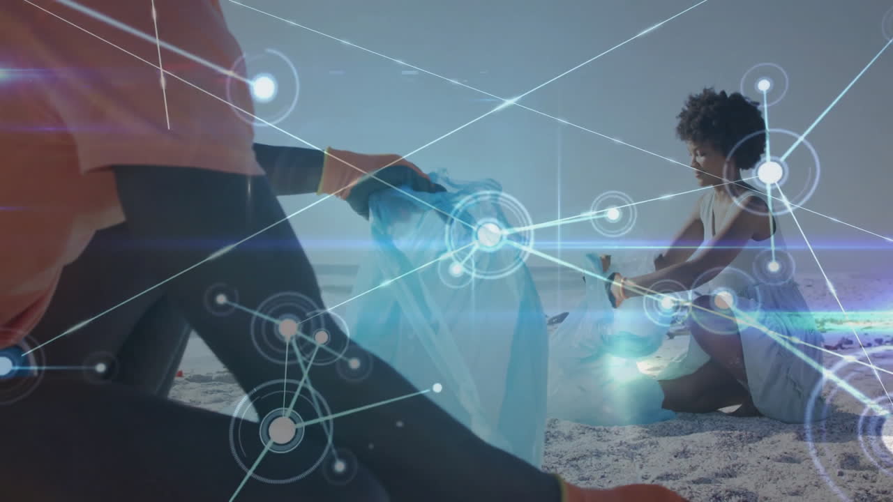 Cleaning beach, people picking up trash with animated network connections overlay