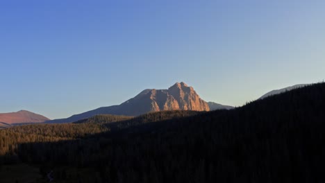 stunning aerial drone landscape nature shot of the beautiful red castle lake mountain up in the high uinta's between utah and wyoming on a backpacking trip on a clear summer evening