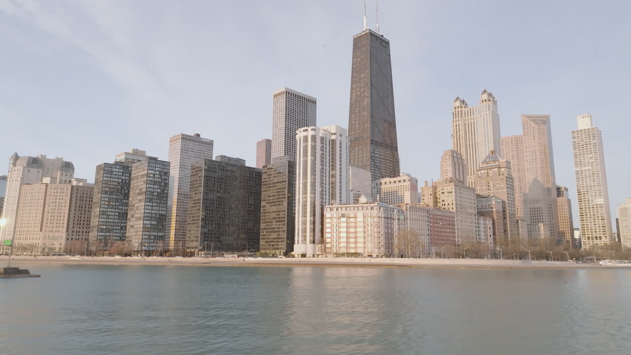 Aerial view of Chicago and Lake Michigan at sunrise.