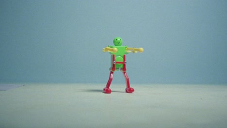 16mm film of dancing toy robot