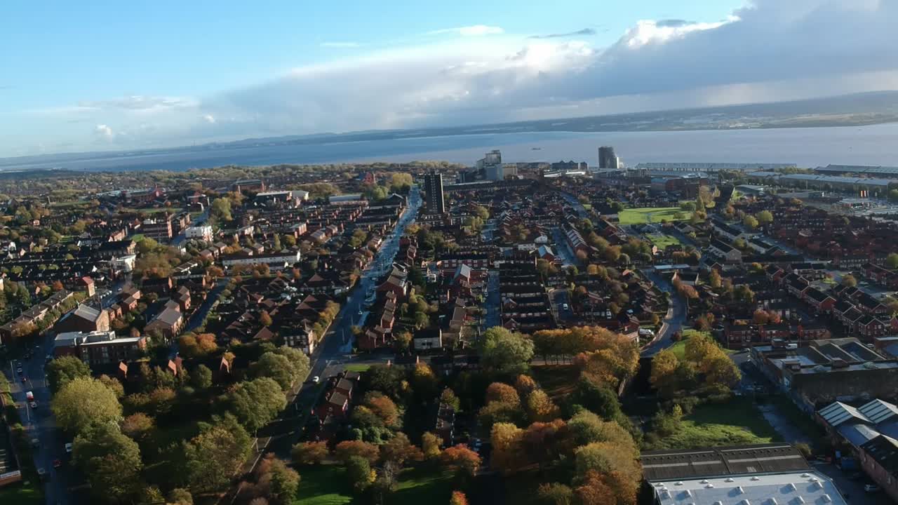 Drone footage around Baltic triangle area in Liverpool city center with astonishing view of  the Irish bay  with extended view of Merseyside.