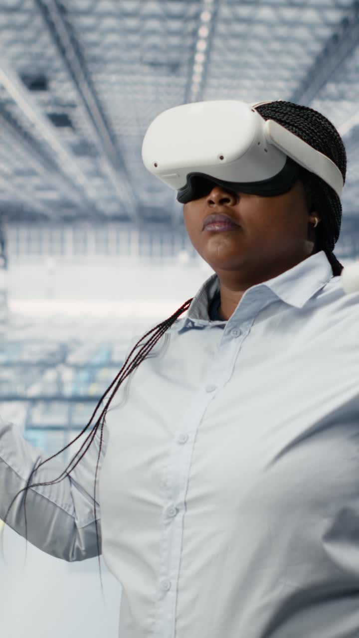 Vertical video Hardware designers in PCB industrial plant using VR headset equipment
