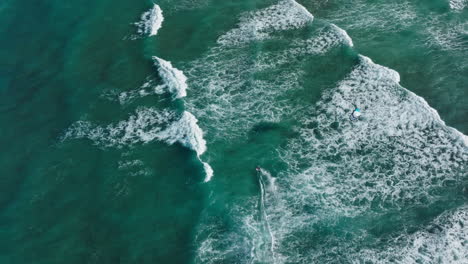 aerial view of windsurfers in the ocean