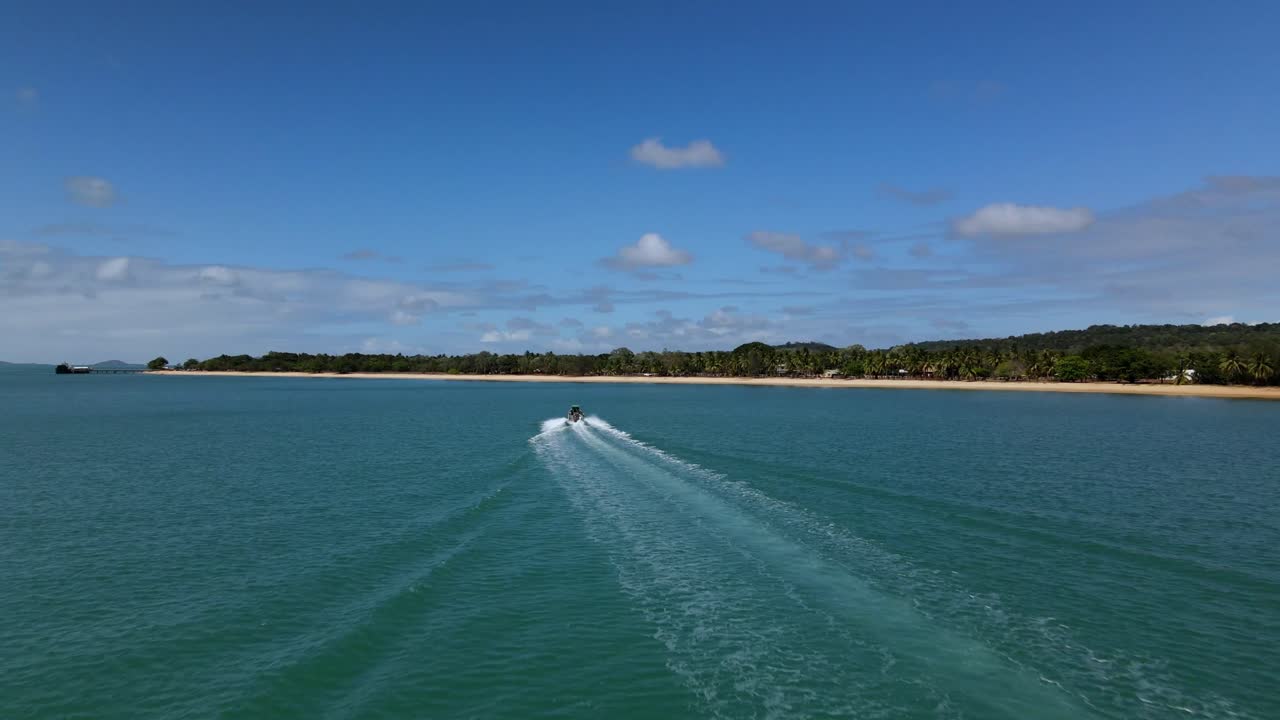 Aerial clip of following a modern fishing boat in Cape York waters. Clip 2