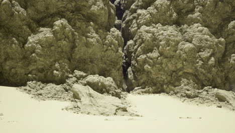 unique rock formations create a striking contrast in a sandy landscape