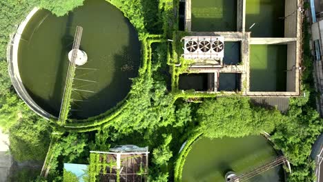 aerial top view 4k of waste water treatment system in industrial estate