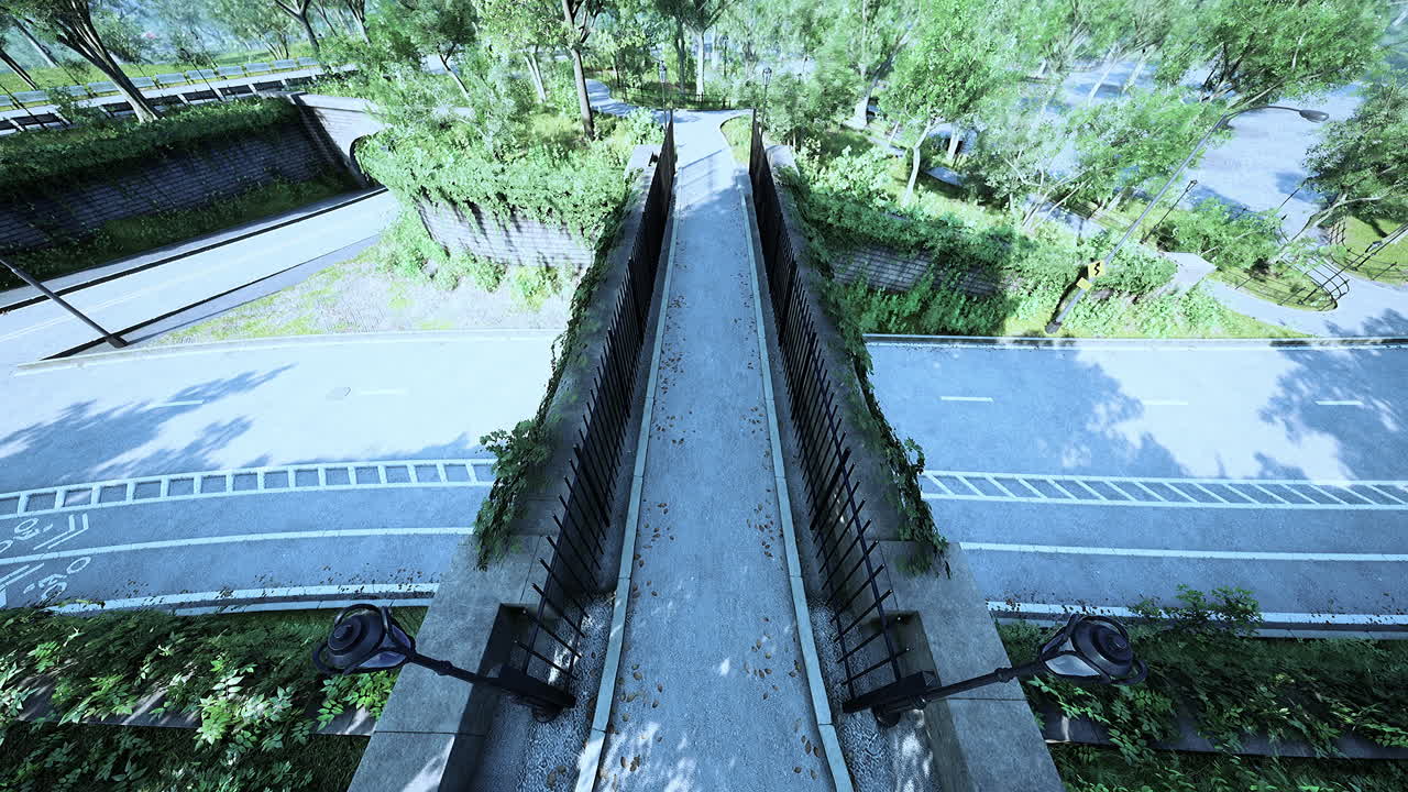 vista desde la altura del parque con un césped verde y senderos