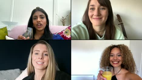 four female friends saying cheers over video chat