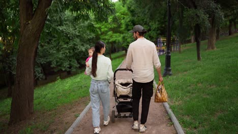 a family walking in the park