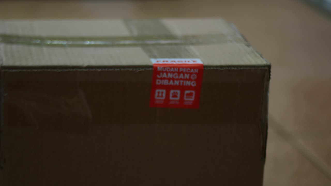 close up of placing a large box or package