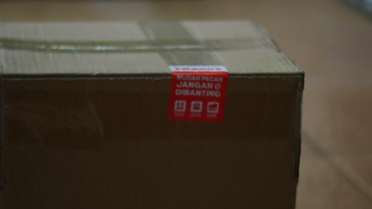 close up of placing a large box or package