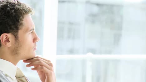 Portrait-of-a-thoughtful-businessman