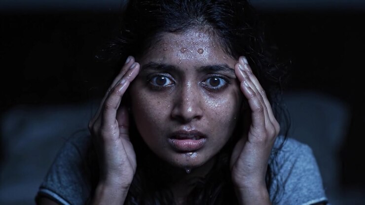 Intense Emotional Moment Captured in a Sequence of Shock and Fear, Featuring a Young Woman Expressing Terror in a Dark Room