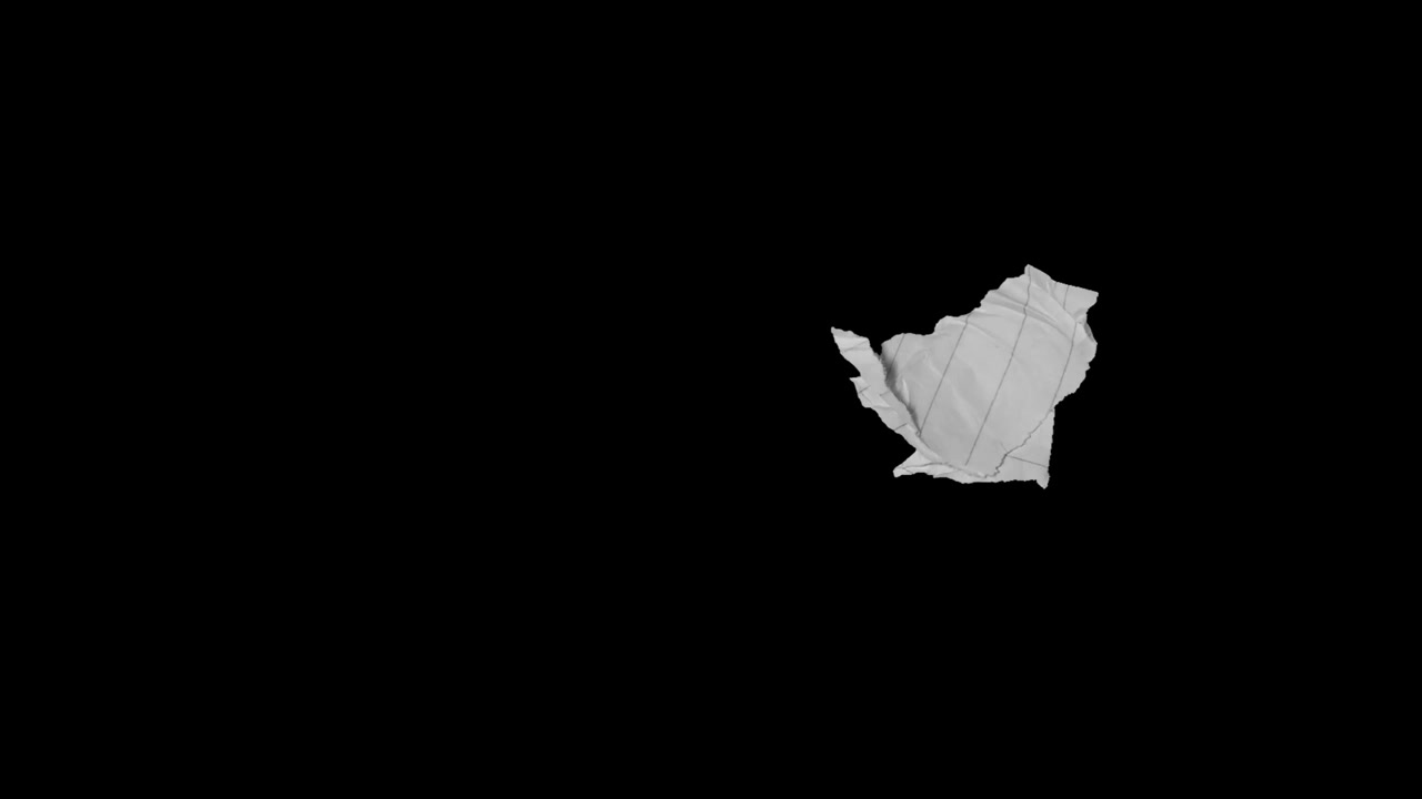 Sheet of Lined Paper Being Crumpled into a Ball