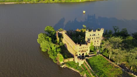 Aerial-drone-footage-of-an-abandoned-castle-on-a-small-island