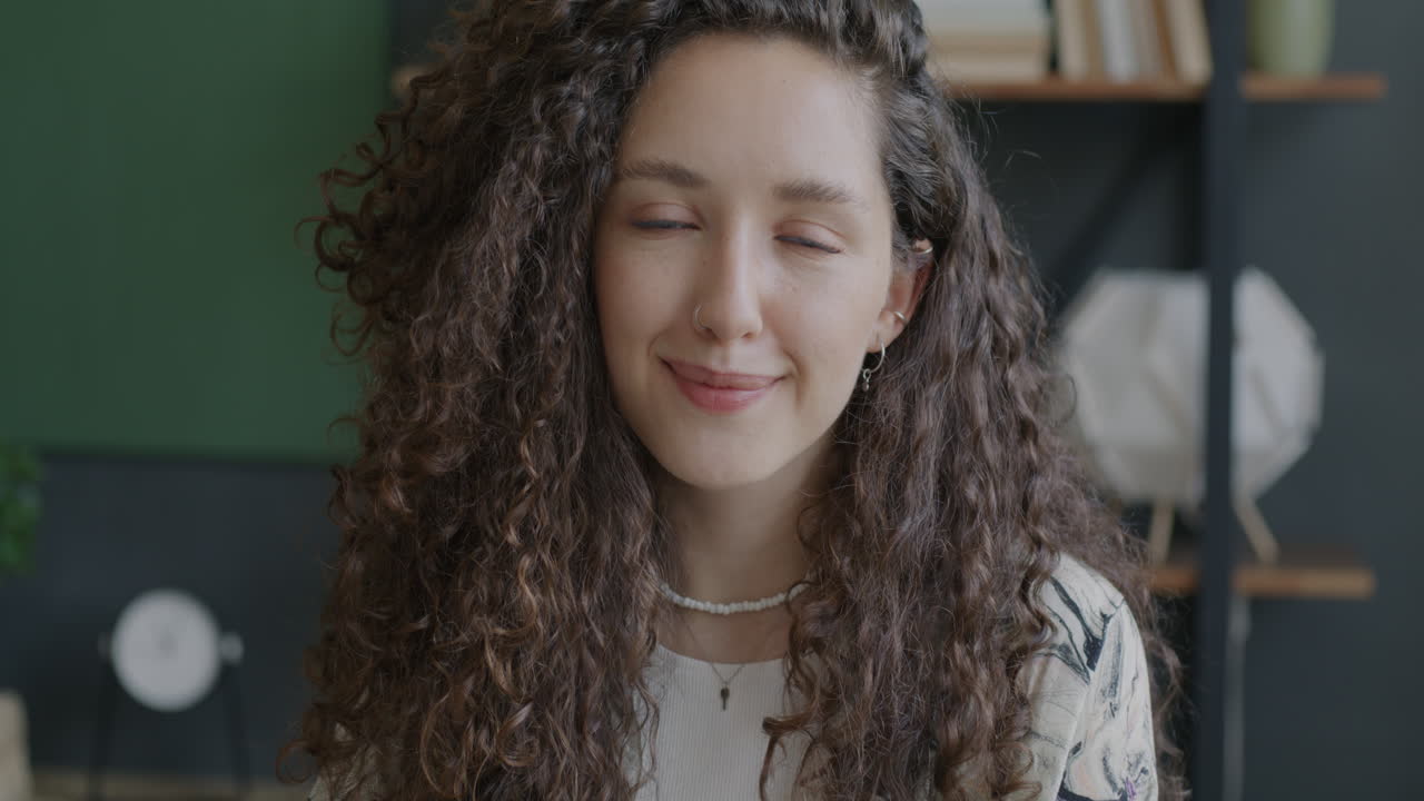 Smiling Woman with Curly Hair