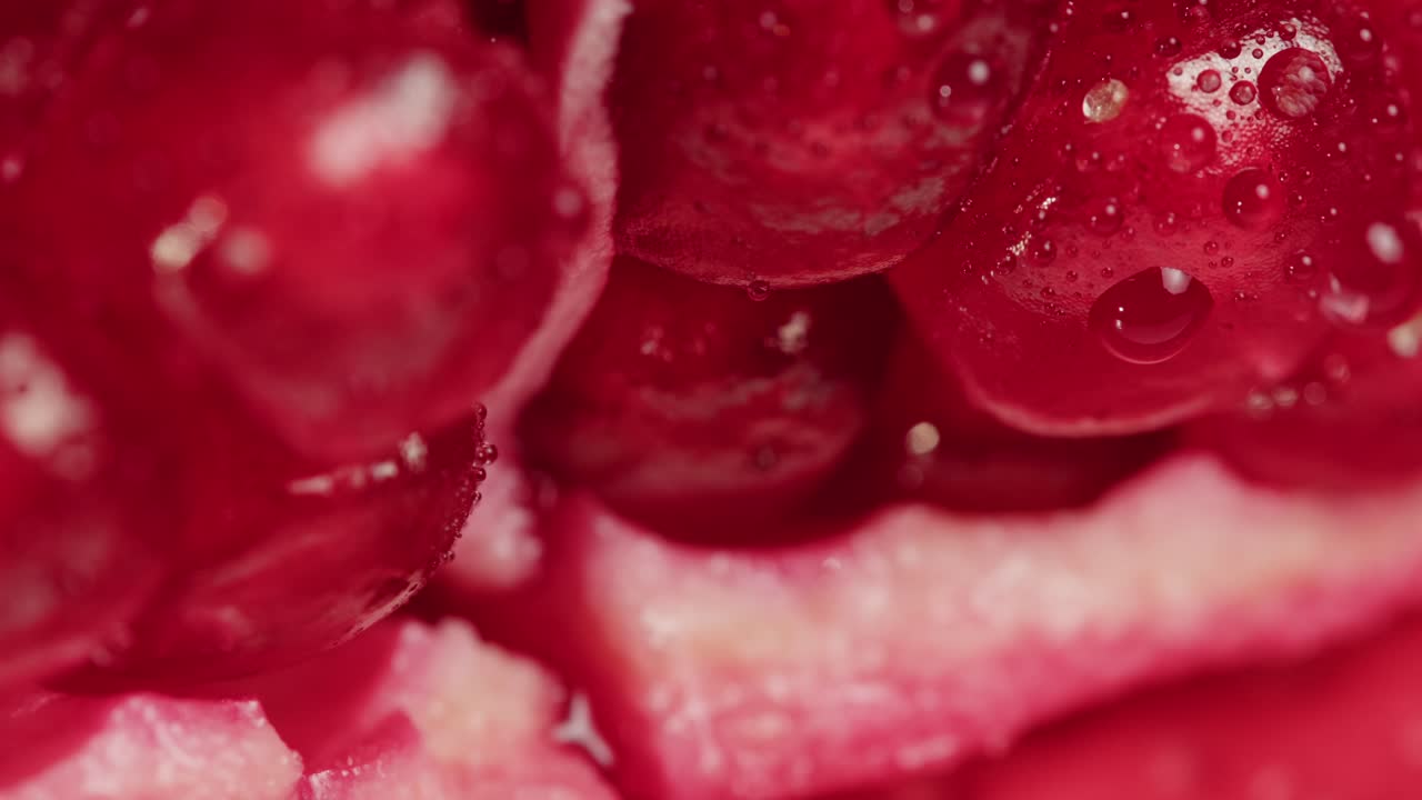Close-up of Fresh Pomegranate Seeds with Water Droplets