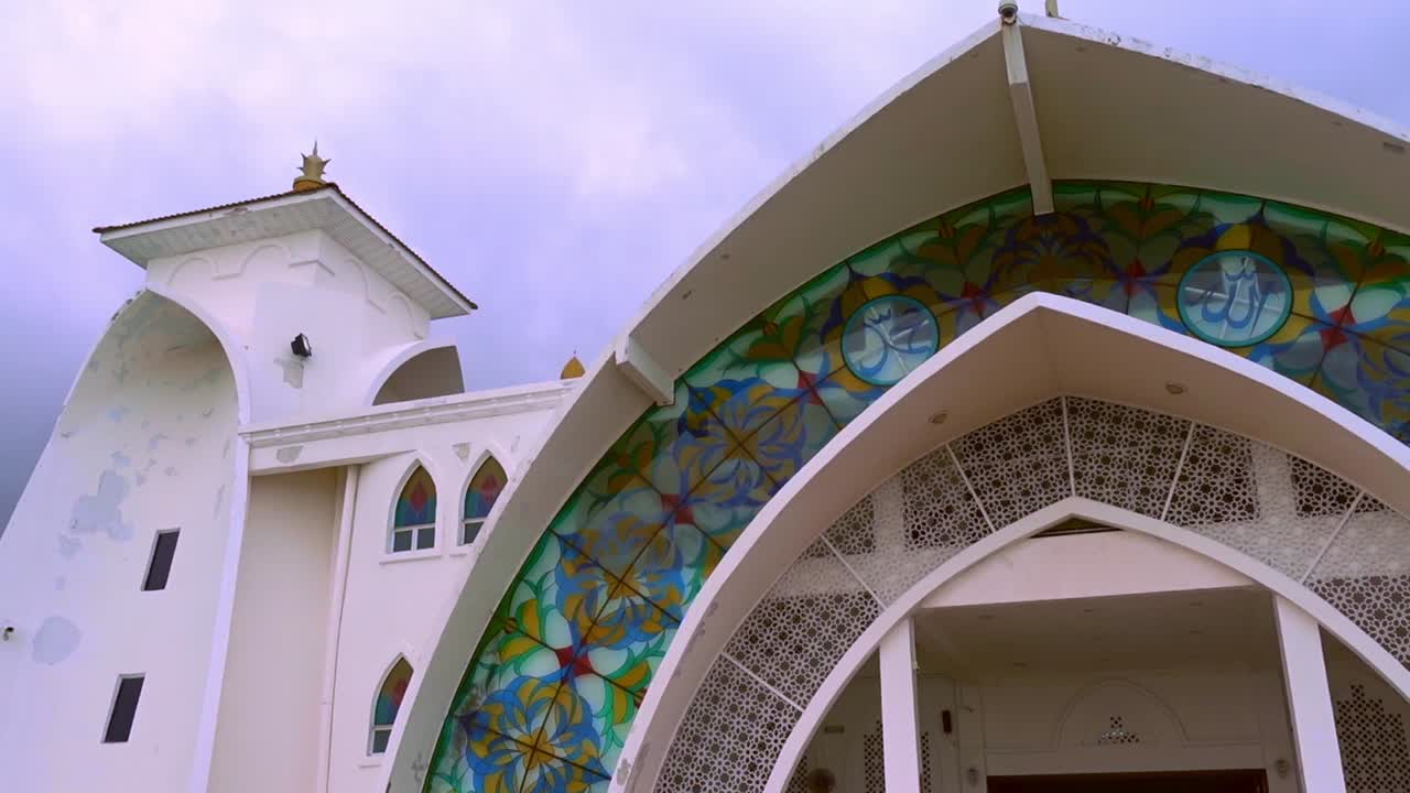 Artistic And Detailed Facade Of Malacca Straits Mosque In Melaka Kuala Lumpur Malaysia - medium dolly shot