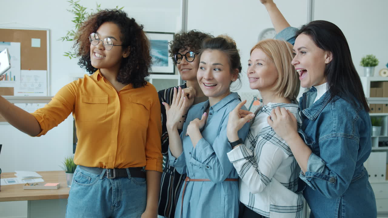 Happy Women Taking a Selfie in the Office