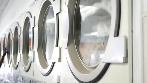 washing machines, public coin laundry, usa. self-service laundromat, laundrette.