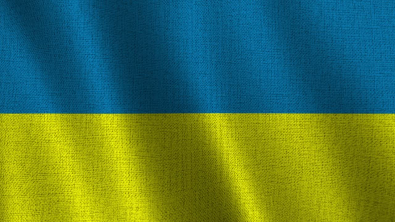 Bandiera sventolante dell'Ucraina con texture in tessuto