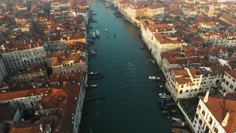 flying over venice city and grand canal in italy - drone shot