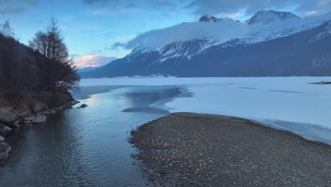 Frozen-lake-Sils-in-Switzerland-during-a-snow-storm