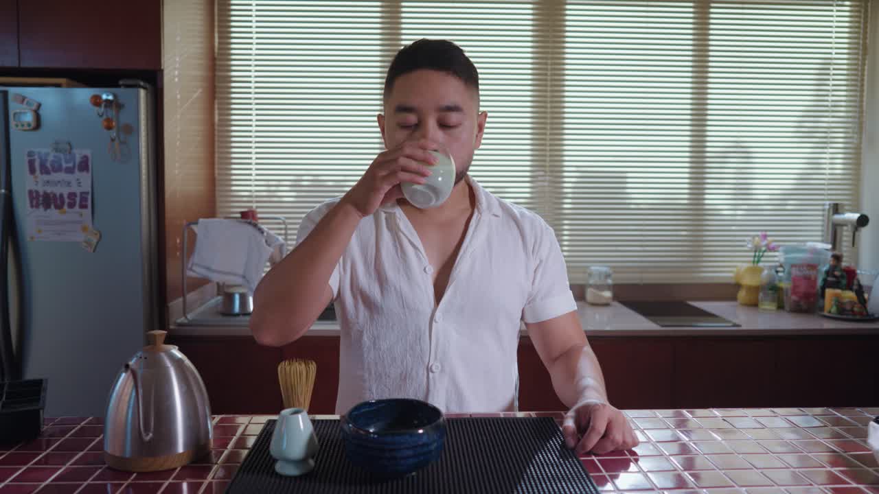 Man enjoying Matcha Tea Ceremony in Kitchen