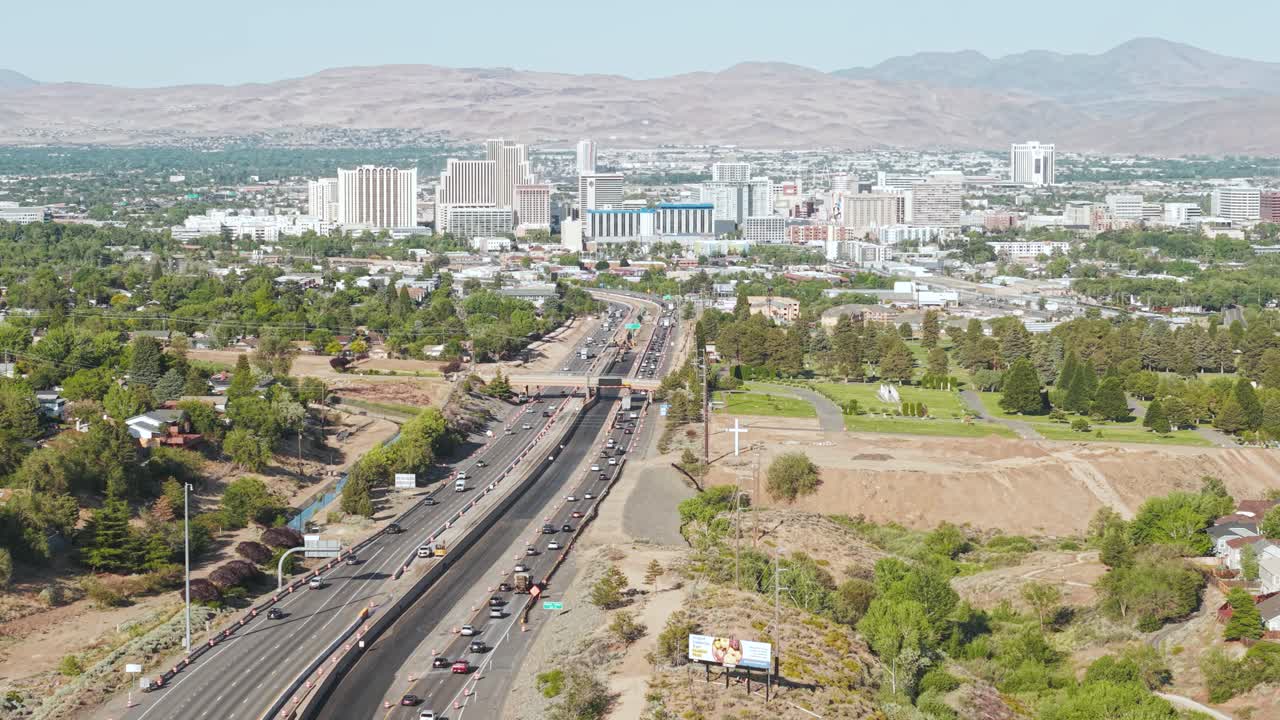 Drone Shot of Reno Nevada USA Cityscape and Interstate 80 Highway Traffic