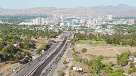 drone shot of reno nevada usa cityscape and interstate 80 highway traffic