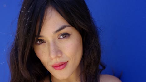 close up of woman with brown eyes and long hair