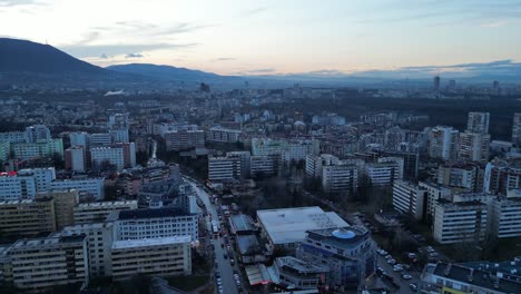 Panoramic-aerial-view-of-Sofia-Bulgaria-skyline-buildings-and-cityscape-at-sunset