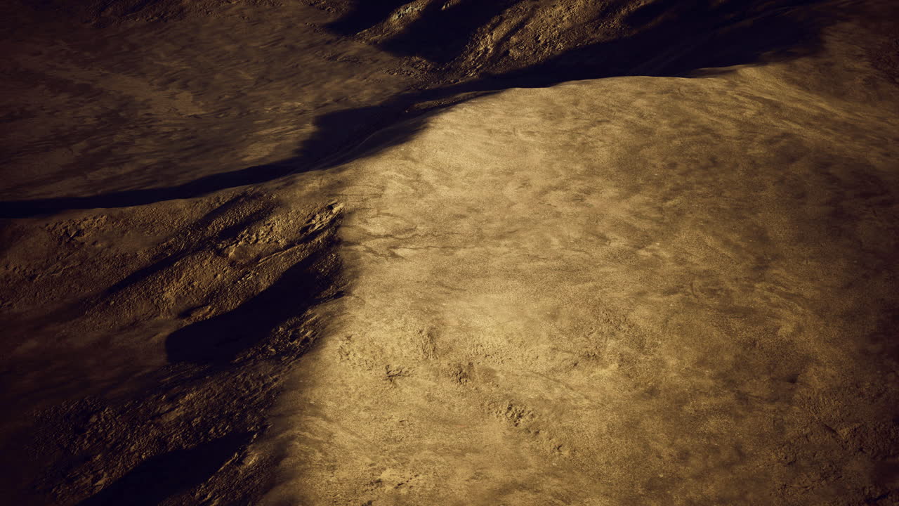 Dramatic terrain highlighting shadows and textures on a mountainous landscape