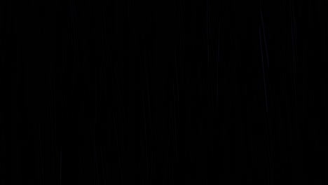 loopable rain falling in front of the camera against black screen