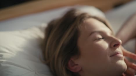 caucasian woman waking up in sunny day with good mood