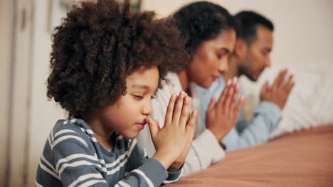 family praying together